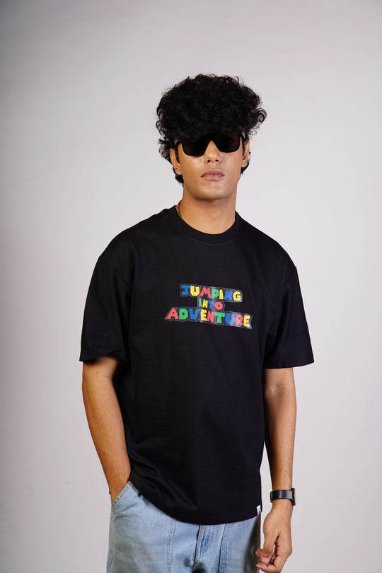 Jumping into Adventure - Black Oversized T-shirt